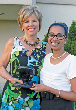 Jo-Anne Jones, left, receives the Elizabeth Craig Award of Distinction from ODHA President Sheniza Blackburn.